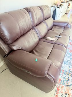 Leather Power reclining Sofa