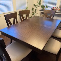 Large Brown Dining Table With Hidden Leaf And 6 Chairs