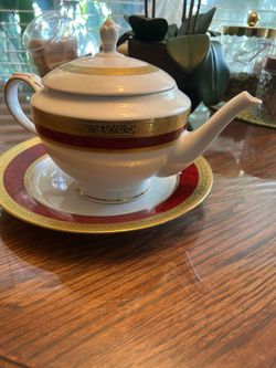Porcelain teapot & plate   Beautiful inside any Buffet or  curio cabinet