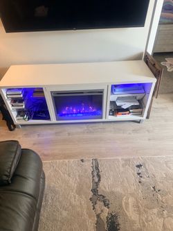 Electric fireplace , and a sectional sofa great price call now