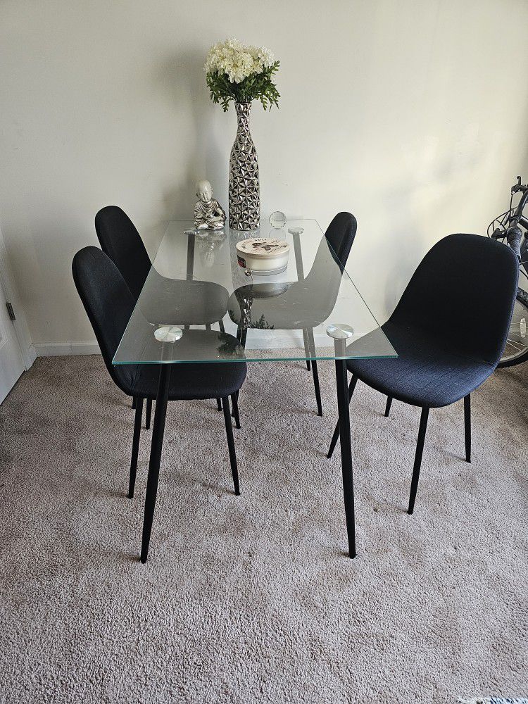 Glass Table With Four Black Chairs Good For Small Spaces In Good Condition No Pets No Smokers 