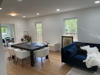 CB2 couch & coffee table, black table, boucle chairs, mirror, furniture