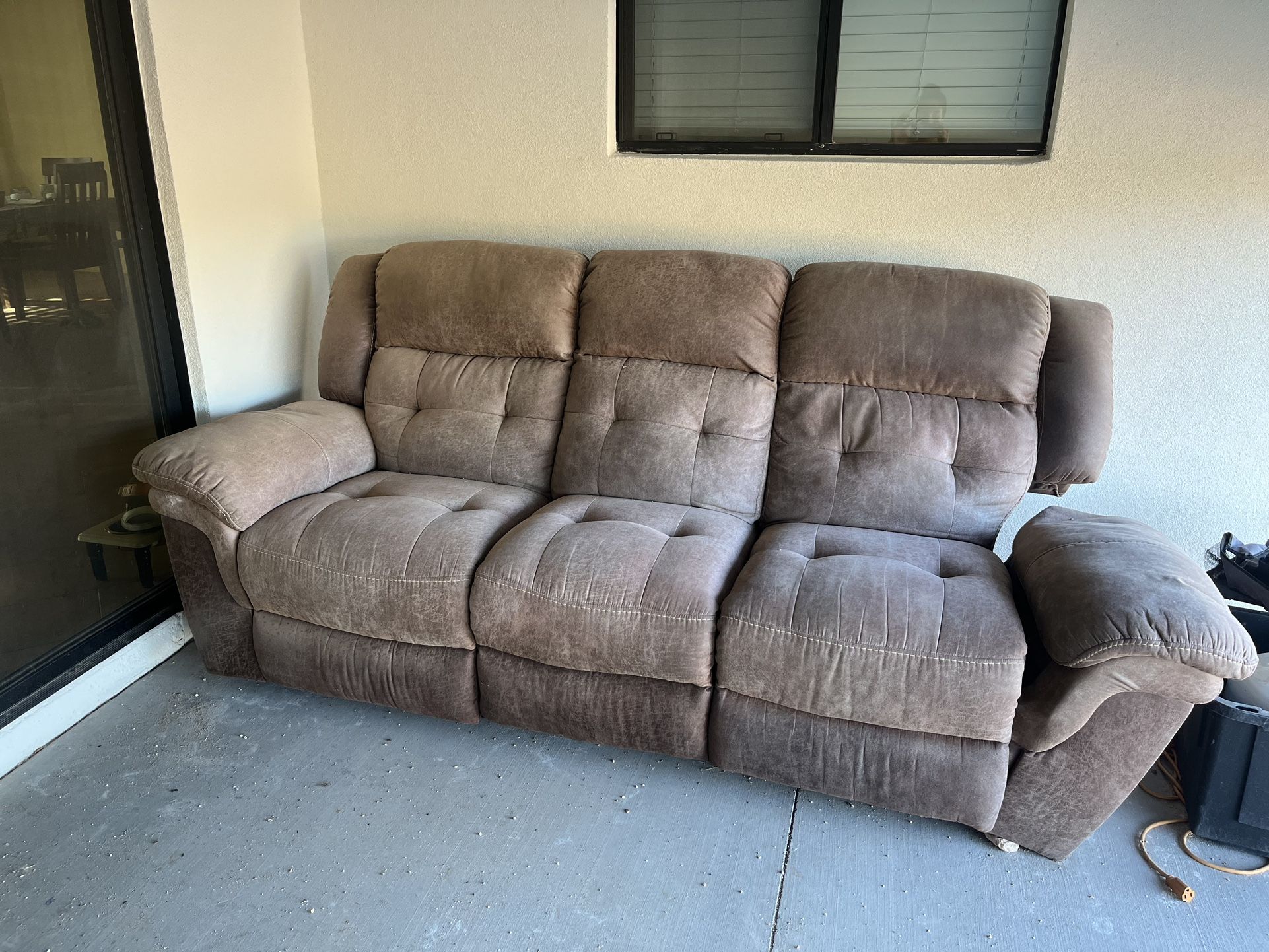 Ashley’s Reclining Sofa