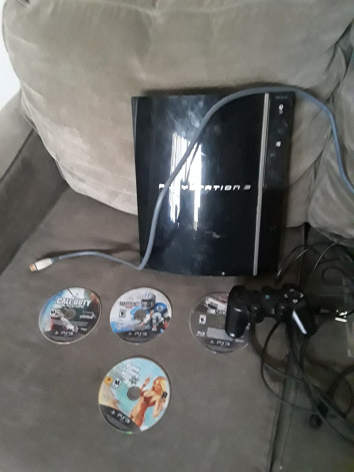 PS3 with 4 games ,hdmi cable and power chord 1 controller