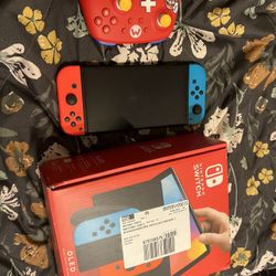 Nintendo Switch Duo With Controllers
