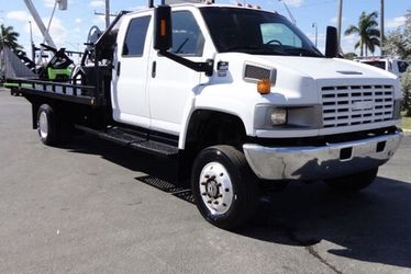 2007 GMC FlatBed We FINANCE if needed!!!! Won't last!! A/C. ALLISON AUTOMATIC TRANSMISSION. 6.6L DURAMAX TURBO DIESEL.. 4X4. ALUMINUM WHEELS. 14FT ST