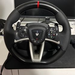 Xbox Wheel, And A Xbox Pedals.