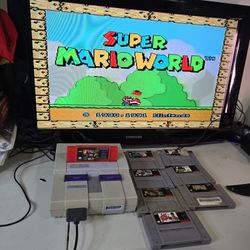 Super Nintendo console bundle With RARE multi packed game