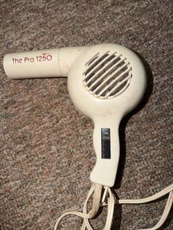 Vintage Kmart the pro 1250 hair dryer is a lil discolored