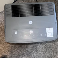 Dehumidifier GE 50-Pint Energy Star Portable Dehumidifier with Built-in Pump and Smart Dry