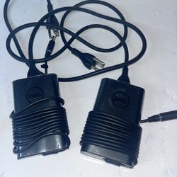 It's a Dell 65W AC adapter 