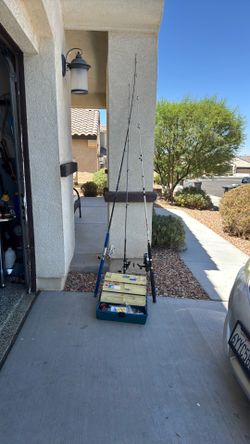 3  fishing rods and reals 1 box