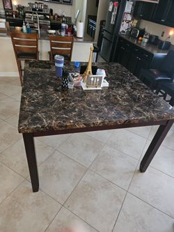Counter height dining table