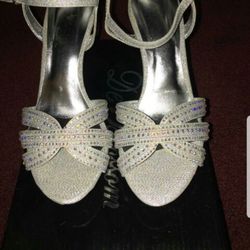 Brand new silver high heels