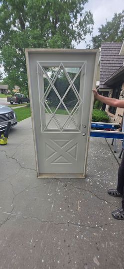 36x80 back or storage door with iron security gate. Framed Ready to install