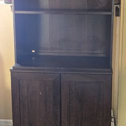   Brown  Book Shelves Plus Storage Down Below 