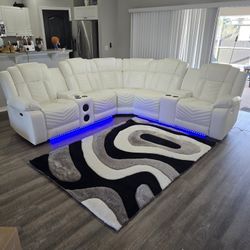 BRAND NEW POWER RECLINING SOFA WITH SPEAKERS, LED LIGHTS, USB, BLUETOOTH, CUP HOLDERS AND ARM STORAGE 