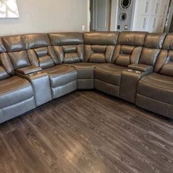 New Reclining Sectional.  Brown Or Grey Gel Leatherette.  106” X 106”.  Free Delivery!