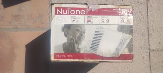 Bathroom exhaust fan w/ light