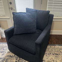 Brynn feather-filled swivel chair