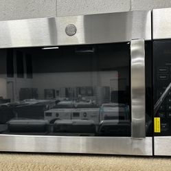 NEW IN BOX! GE Stainless Steel Microwave