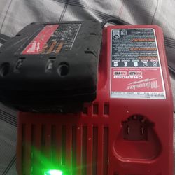 Milwaukee M12 M18 Battery Charger With 1.5 Battery In Good Conditions 