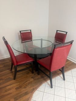Glass Dining Table with 4 Red Chairs