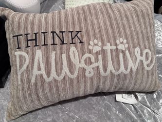 Think Pawstive throw pillow