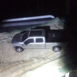 A GMC 4x4 Silver Truck