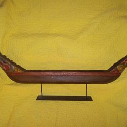 A Wooden Boat From Pearl One Imports