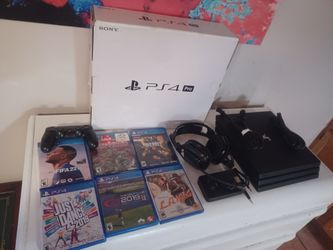 Ps4 pro 1tb with 6 games, one controller and headphones