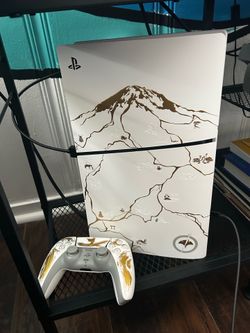 PS5 with custom Ghost of Yotei case and controller