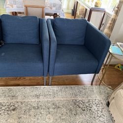 Two blue sofas