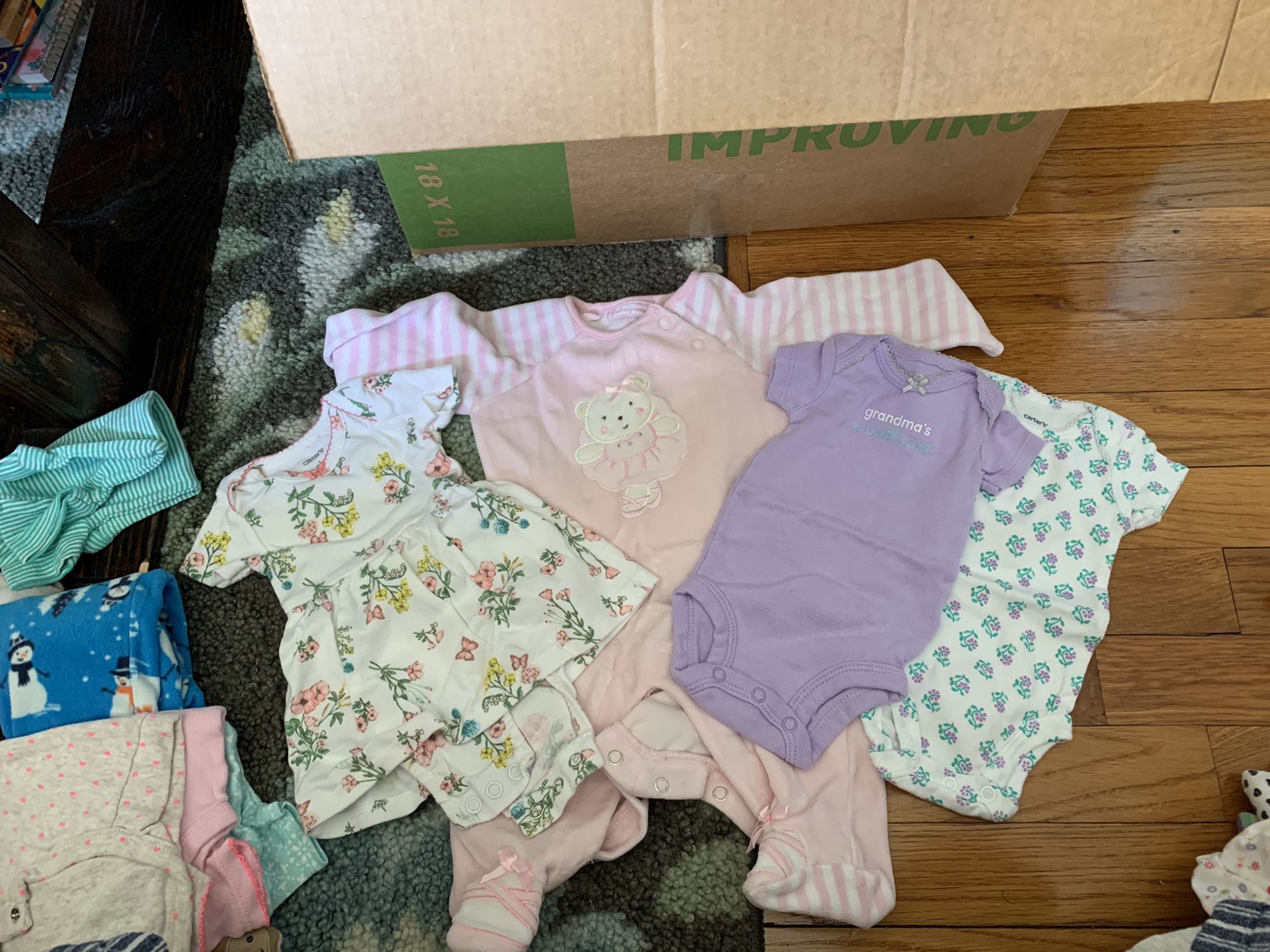 Free bag of clean NB and 0-3 month baby girl clothes