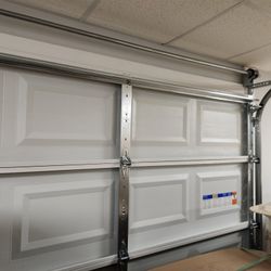 Clopay White Noninsulated 16 ft x 7 ft Garage Door