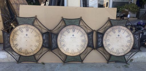 Antique look metal clocks. Missing handles. 32 inches.
