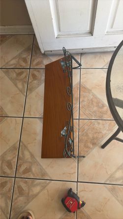Wood shelf with dark green iron frame