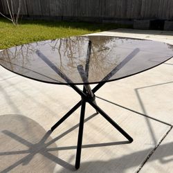 Glass top dining/coffee Table
