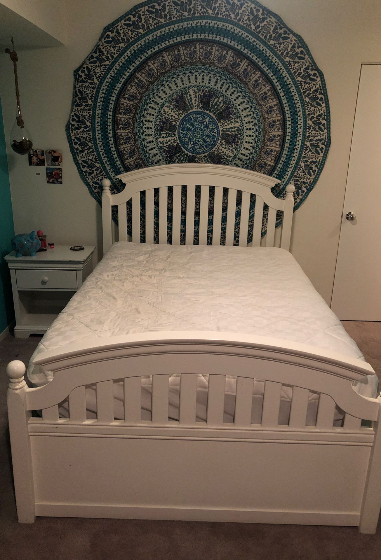 Full bed frame with box spring, mattress, dresser and side table