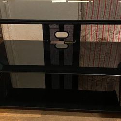 jet black glass and steel tv console