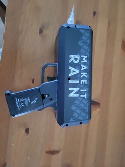 Make it rain fake money thrower gag gift