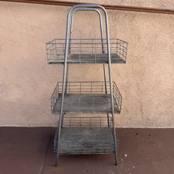 3  Shelves In Good Condition  Metal  Almost 16 Inches Wide  11 Inches Side  3 Feet Tall