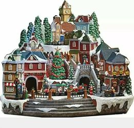 Christmas Village Animated with Lights Music and a Rotating Tree and Train