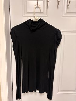 Black long sleeve turtleneck blouse with puffy sleeves