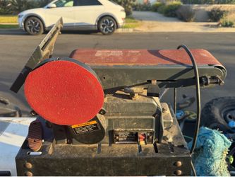 Electric sander on stand