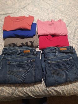 Size  22  jeans 2 pair  comfortable denium.  And 5 torrid t-shirts  total price 12 dollars for everything