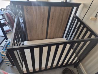 Mini crib and changing table set