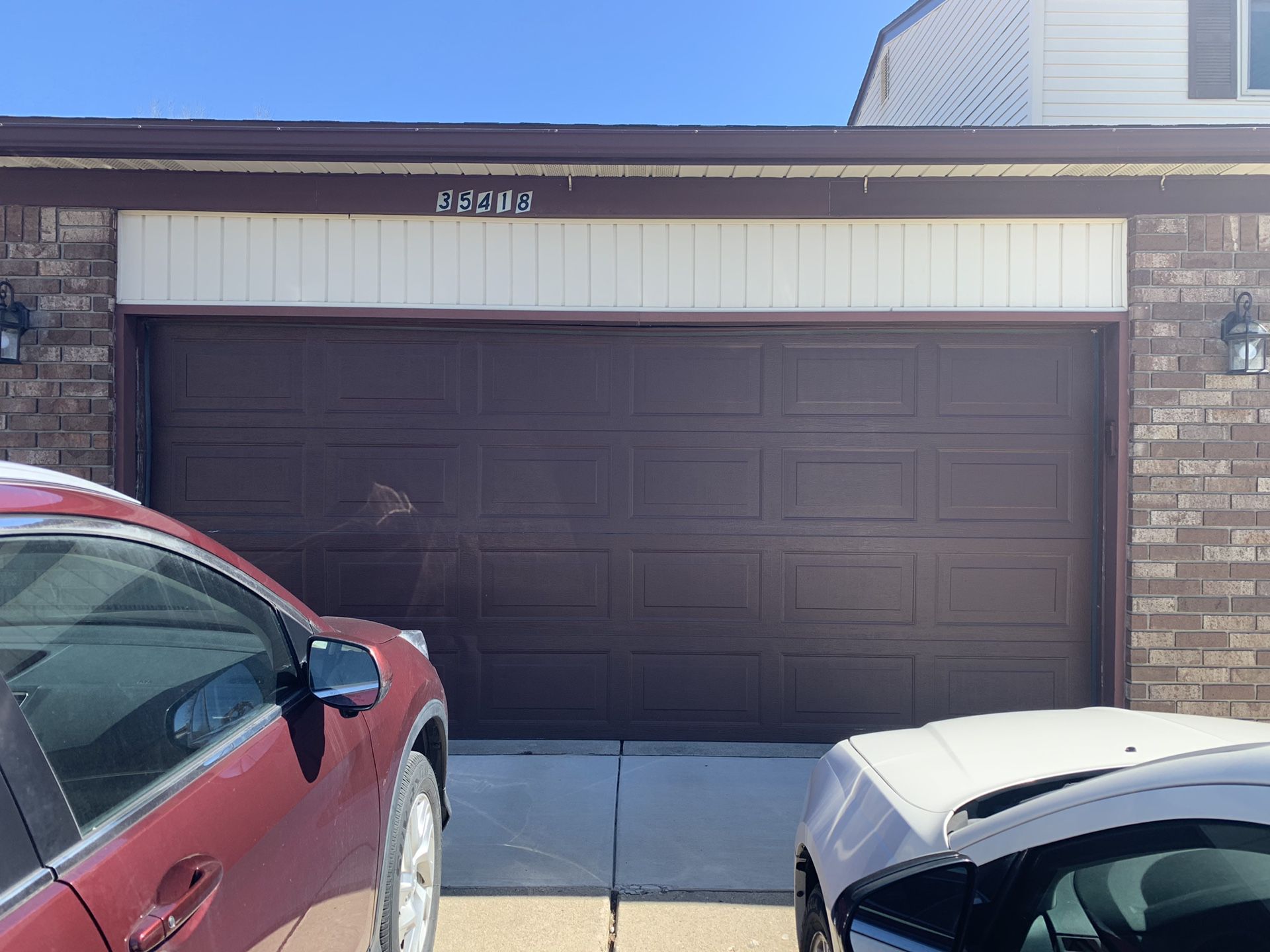 Garage door with motor insulated size 7X16 2 cars size good condition it’s been already taken down and its 5 years old