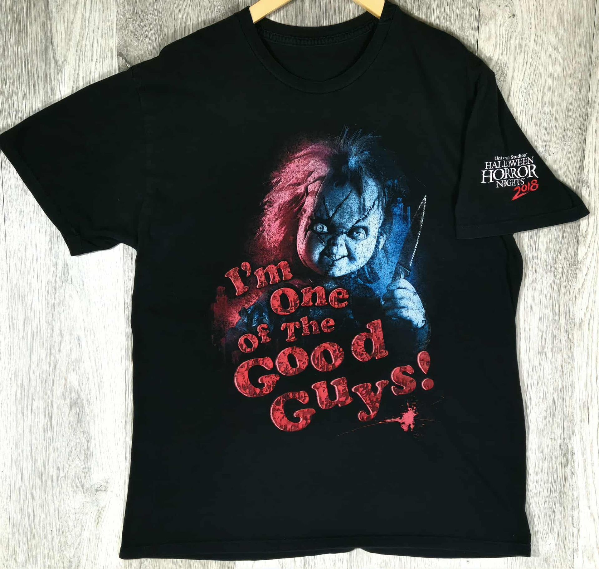 Black Universal Studios Halloween Horror Nights 2018 t-shirt featuring Chucky with the text “I’m One of the Good Guys!” printed on the front in red an
