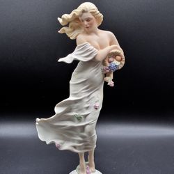 Franklin Mint "Earth Woman" porcelain figurine by Emily Kaufman